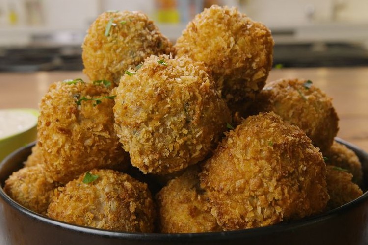 Dish piled with fried Boudin balls